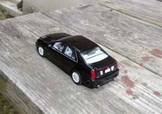 Extremely rare 1/43 model of 2005 Cadillac STS created by Norev.
