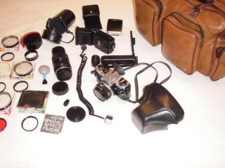 Olympus OM 10 Camera with 50 mm Lens Kit and Accessories