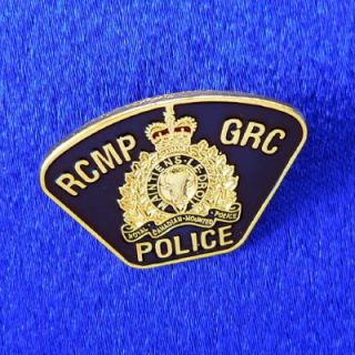 This is a new Royal Canadian Mounted Police shoulder flash lapel pin 