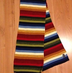 Cejon Multi colored striped knitted scarf. Outstanding colors