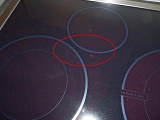   30HYBRID INDUCTION COOKTOP SS EW30CC55GS SM SCUFF ON THE CERAMIC TOP