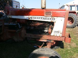 International Farmall Tractor 706 with Set of Round Fenders
