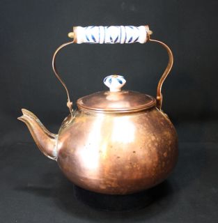 copper clad tea kettle w/ blue & white porcelain handle