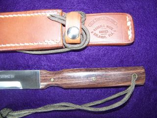 comes with a tan johnson rough back jack crider special box sheath
