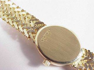 We are pleased to offer this beautiful 14K gold Croton quartz watch.