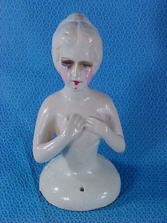 Up for auction is a nice antique Chalkware Half or Pincushion Doll. 5