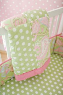 The Pixi Baby in Pink 6 Piece Crib Bedding set includes quilt, bumper