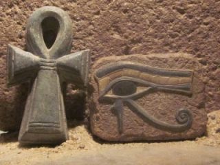 Egyptian Art   Eye of Horus and Ankh amulet. Ancient Egypt carving
