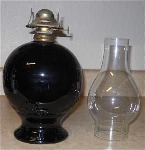  BLACK POTTERY LAMP WITH RAISED FLEUR DE LIS DESIGN AROUND BASE