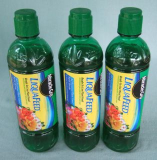 Bottles of Miracle Gro Liquafeed Liquid Plant Food