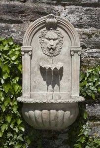 lion head wall outdoor water fountain