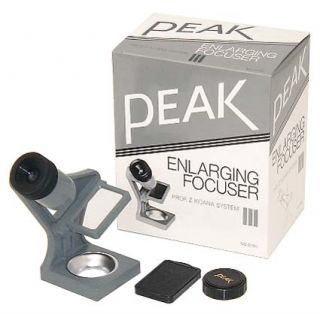 the majority of enlarger focusing aids require that they be placed