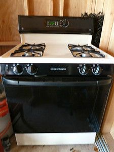 GE XL44 Self Cleaning Gas Range and GE Profile Spacemaker XL Microwave