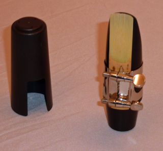  generic alto sax mouthpiece with ligature and cap this is a generic