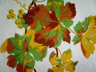 linen tablecloth showing 12 delectable vignettes of wine grapes grape