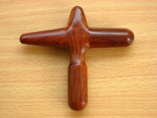  is a beautiful wooden hand and any purpose massager made of rosewood