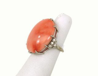 this is a hefty 18k gold diamonds and red coral ladies