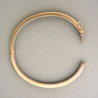 Solid 18k white gold hinged bangle bracelet. Brush finish and nice