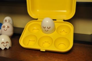 Tommy Hide and Squeak Eggs Shape Sorting Educational Toy