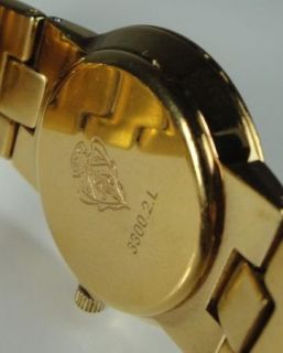 Ladies Gucci MOP Mother of Pearl Gold Tone Watch Roman Numeral 3300 2L