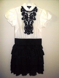 BEBE Fabulous Black and Cream Ruffle Front with A Tiered Skirt Fitted