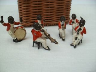 A Collection of Antique Black Band Musicians Figures Toys Cake Decorations  
