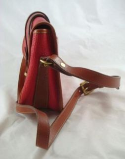 Dooney And Bourke Red Pebble Leather And Brass Equestrian Cross Body Handbag  