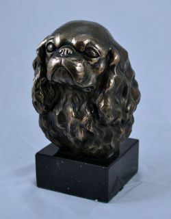 King Charles Spaniel on marble statue figurine sculpture head Cold