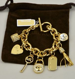 Michael Kors Golden Tone Charm Toggle Bracelet Signature Logo Links $