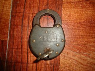 Antique brass miller pad lock and key works like the day it was made