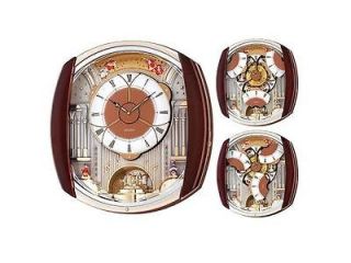 Seiko Melodies in Motion Rotating Pendulum Opening Dial Wall Clock