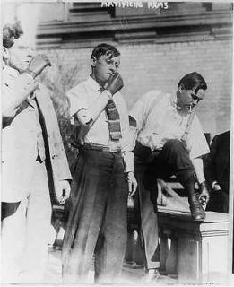Artificial arms,New York City,N.Y.C.,3 men using aritificial arms,1915