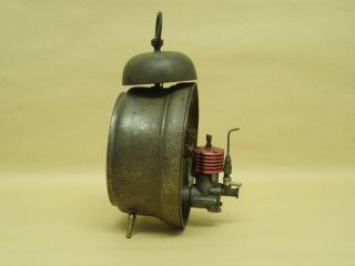 PETROL ENGINE CLOCK, GMO antique model, signed