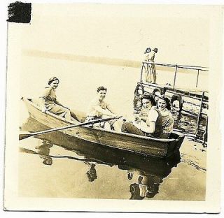Young Ladies With Oars In Row Boat Pull Up To Dock Vintage Snapshot