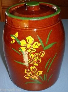 Vintage pottery cookie jar with cold painted flowers