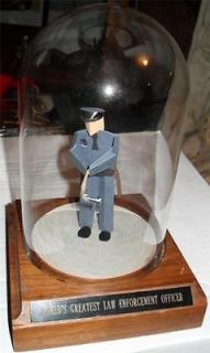 WORLDS GREATEST LAW ENFORCEMENT OFFICER FIGURE POLICE IN GLASS CASE