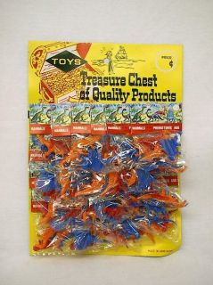 Vintage Display card of 24 Packages of Mini Dinosaurs Mammals