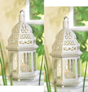 Two (2) white metal clear glass moroccan hurricane candle holder