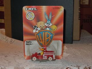 Daffy Duck driving a fire truck, Ertl, TM& Warner Bros. 1988