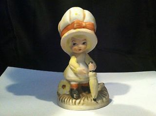 VINTAGE TOMA FIGURINE STATUE PAPERWEIGHT LITTLE GIRL IN A BONNET WITH
