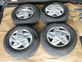 95 99 Mitsubishi eclipse OEM wheels rims w/ tires and hub caps STOCK