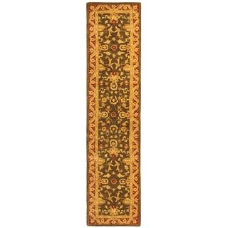 Handmade Kashan Charcoal/ Red Wool Runner (23 X 8) (GreenPattern OrientalMeasures 0.625 inch thickTip We recommend the use of a non skid pad to keep the rug in place on smooth surfaces.All rug sizes are approximate. Due to the difference of monitor colo