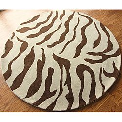 Nuloom Zebra Animal Pattern Brown/ Ivory Wool Rug (6 Round) (IvoryPattern AnimalMeasures 1 inch thickTip We recommend the use of a non skid pad to keep the rug in place on smooth surfaces.All rug sizes are approximate. Due to the difference of monitor c