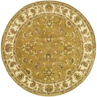 Handmade Heritage Tabriz Mocha/ Ivory Wool Rug (6 Round) (GoldPattern OrientalTip We recommend the use of a non skid pad to keep the rug in place on smooth surfaces.All rug sizes are approximate. Due to the difference of monitor colors, some rug colors 
