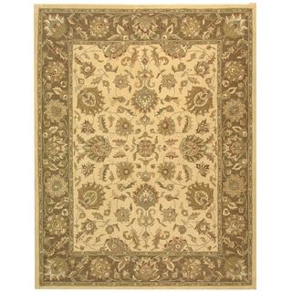 Handmade Heritage Kerman Ivory/ Brown Wool Rug (6 X 9) (IvoryPattern OrientalMeasures 0.625 inch thickTip We recommend the use of a non skid pad to keep the rug in place on smooth surfaces.All rug sizes are approximate. Due to the dyeing process and the