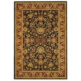 Handmade Kashan Charcoal/ Red Wool Rug (6 X 9) (GrayPattern OrientalMeasures 0.625 inch thickTip We recommend the use of a non skid pad to keep the rug in place on smooth surfaces.All rug sizes are approximate. Due to the difference of monitor colors, s
