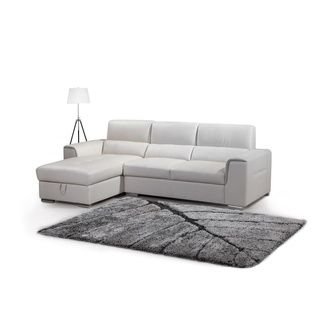 Tisha Sectional Off White (Off WhiteFinish N/ADimensions Tisha Sectional Love 67 in. length x 36 in. depth x 36 in. height; Tisha Storage Chaise 40 in. length x 65 in. depth x 36 in. heightDurable ConstructionAssembly Required Bonded LeatherUpholstery