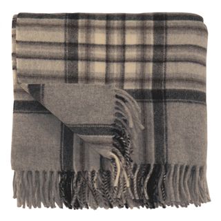 Bocasa Karo Brown Woven Wool Blanket (BrownMaterials 100 percent pure new woolCare instructions Dry clean Dimensions 50 inches wide x 67 inches long Made in GermanyThe digital images we display have the most accurate color possible. However, due to dif