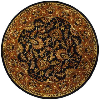 Handmade Heritage Kashan Dark Green/ Gold Wool Rug (6 Round) (GreenPattern OrientalMeasures 0.625 inch thickTip We recommend the use of a non skid pad to keep the rug in place on smooth surfaces.All rug sizes are approximate. Due to the difference of mo