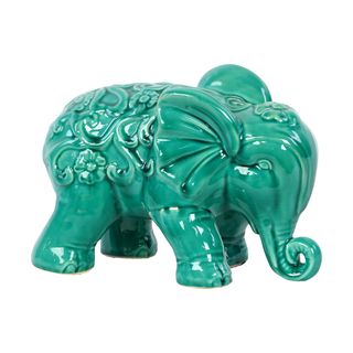 Turquoise Ceramic Elephant (TurquoiseDimensions 7 inches high x 10.5 inches wide x 6 inches deep CeramicColor TurquoiseDimensions 7 inches high x 10.5 inches wide x 6 inches deep)